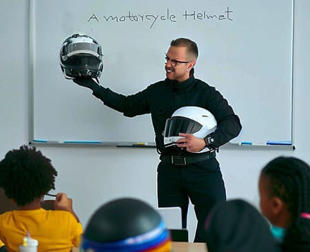 motorcycle helmet donation to school